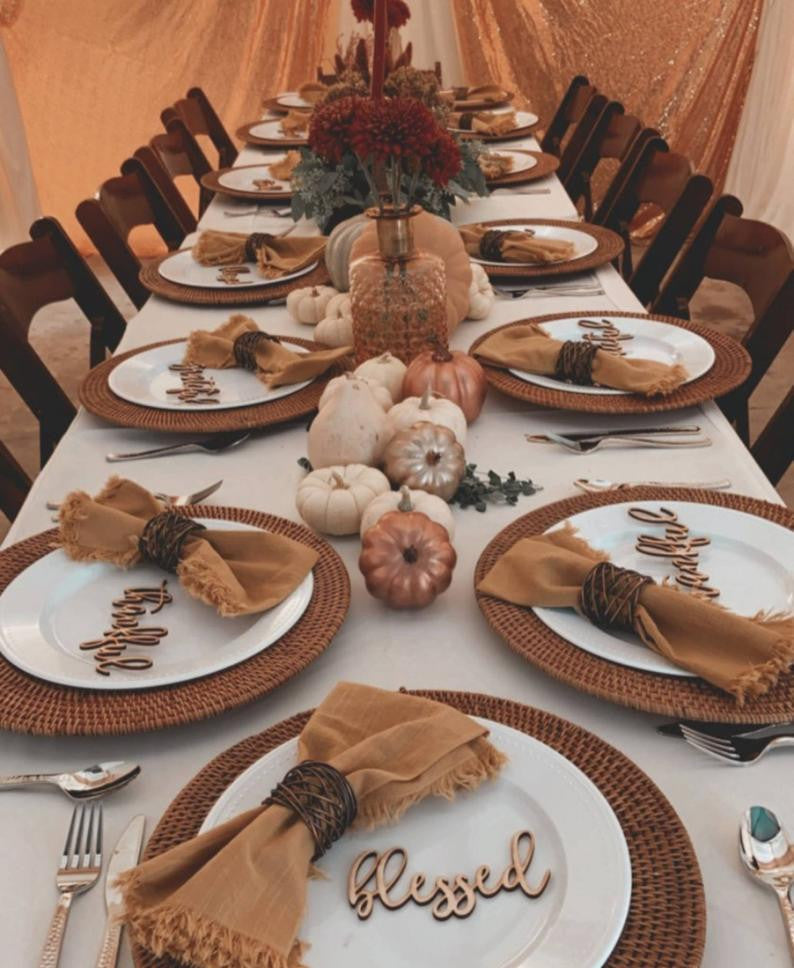 Thankful, Grateful, Blessed wood place signs on a Thanksgiving table